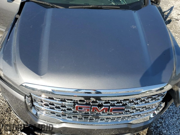 2021 GMC Acadia Denali z VIN 1GKKNPLSXMZ194932, wystawiony jako Copart lot #56885765 z przebiegiem Nie podano mil oraz Szkoda całkowita • Salvage title. Historia ofert i sprzedaży dostępna na DreamBid. Obrazek 12.
