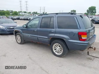 2002 Jeep Grand Cherokee Limited with VIN 1J4GW58NX2C184028, listed as a IAAI auction lot 42503836 with 121,193 mi miles and . Bid and sale history available at DreamBid. Image 3.