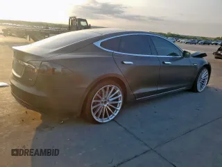2013 Tesla Model S with VIN 5YJSA1CG0DFP15615, listed as a Copart auction lot 50795235 with 156,030 mi miles and Salvage title. Bid and sale history available at DreamBid. Image 3.