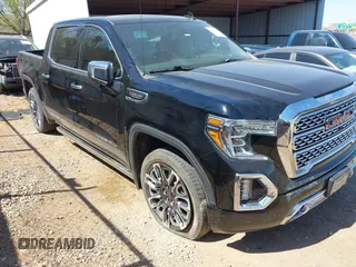 2019 GMC Sierra 1500 Denali z VIN 1GTU9FEL1KZ304272, wystawiony jako IAAI lot #41855066 z przebiegiem 84 602 mil mil oraz . Historia ofert i sprzedaży dostępna na DreamBid. Obrazek 1.