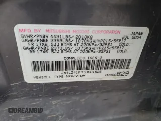 2005 Mitsubishi Outlander z VIN JA4LZ41F75U601526, wystawiony jako Copart lot #50974665 z przebiegiem 265 611 mil mil oraz Szkoda całkowita • Salvage title. Historia ofert i sprzedaży dostępna na DreamBid. Obrazek 13.