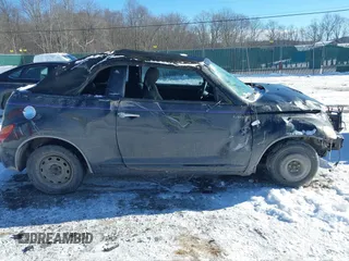 2005 Chrysler PT Cruiser with VIN 3C3EY45X85T329359, listed as a IAAI auction lot 41372450 with 104,219 mi miles. Bid and sale history available at carsss.com. Image 13.