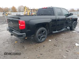 2015 Chevrolet Silverado 1500 LS with VIN 1GCRCPEH5FZ410299, listed as a IAAI auction lot 41106429 with 154,124 mi miles and . Bid and sale history available at DreamBid. Image 4.
