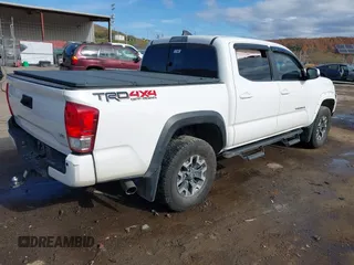 2017 Toyota Tacoma SR5 with VIN 3TMCZ5AN8HM063513, listed as a IAAI auction lot 40703177 with 42,323 mi miles and . Bid and sale history available at carsss.com. Image 4.