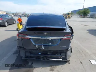 2019 Tesla Model X 75D with VIN 5YJXCBE23KF183801, listed as a IAAI auction lot 41757119 with Not Provided miles and . Bid and sale history available at carsss.com. Image 15.