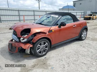 2013 MINI Roadster with VIN WMWSY1C5XDT625456, listed as a Copart auction lot 51426665 with 38,903 mi miles and Salvage Title. Bid and sale history available at DreamBid. Image 1.