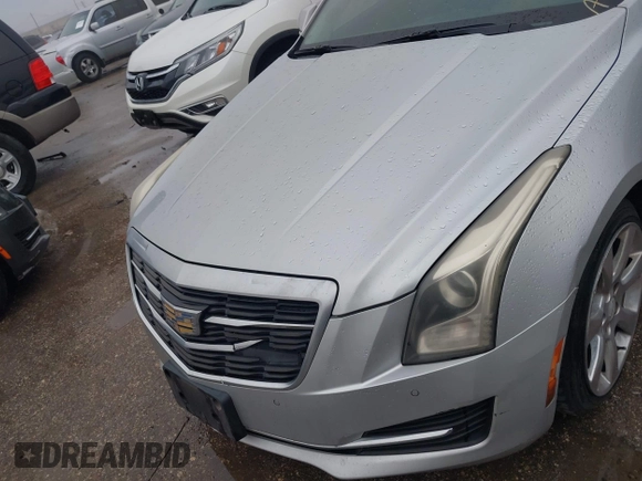 2016 Cadillac ATS Luxury Collection RWD z VIN 1G6AB5RXXG0102222, wystawiony jako IAAI lot #41451531 z przebiegiem 176 287 mil mil oraz . Historia ofert i sprzedaży dostępna na DreamBid. Obrazek 6.