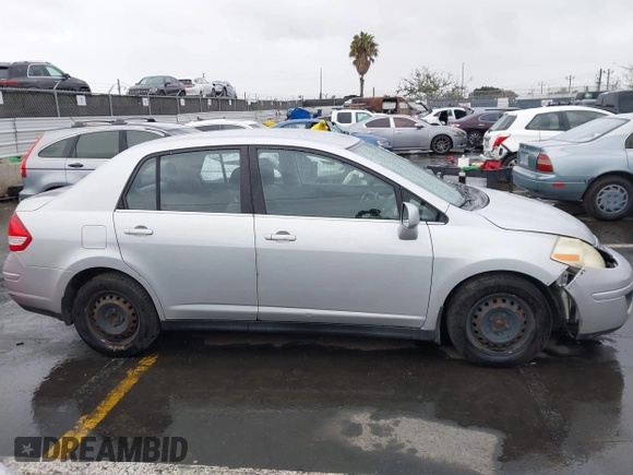 2009 Nissan Versa S with VIN 3N1BC11E39L364397, listed as a IAAI auction lot 41788772 with 223,959 mi miles and . Bid and sale history available at DreamBid. Image 13.