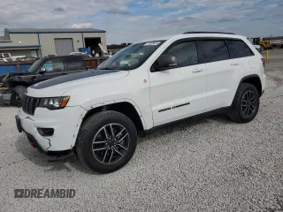 2019 Jeep Grand Cherokee Trailhawk with VIN 1C4RJFLT5KC645905, listed as a Copart auction lot 77326424 with 76,693 mi miles and Salvage title. Bid and sale history available at DreamBid. Image 1.