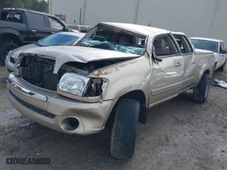 2005 Toyota Tundra SR5 with VIN 5TBET34165S477093, listed as a IAAI auction lot 41422879 with 154,445 mi miles. Bid and sale history available at carsss.com. Image 2.