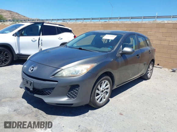 2012 Mazda 3 i Touring with VIN JM1BL1L82C1679145, listed as a IAAI auction lot 42239504 with 454,704 mi miles and . Bid and sale history available at DreamBid. Image 2.