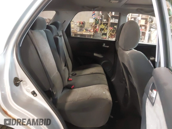 2005 Kia Sportage LX with VIN KNDJE723X57071792, listed as a IAAI auction lot 41441318 with 249,652 mi miles and . Bid and sale history available at carsss.com. Image 8.