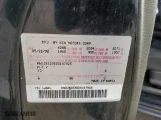 2002 Kia Sportage with VIN KNDJB723625167905, listed as a Copart auction lot 74193854 with 98,864 mi miles and Salvage Title. Bid and sale history available at carsss.com. Image 14.