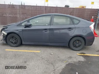 2015 Toyota Prius Four with VIN JTDKN3DU4F1997127, listed as a IAAI auction lot 42194940 with 100,598 mi miles and . Bid and sale history available at DreamBid. Image 14.