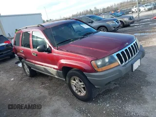 2002 Jeep Grand Cherokee with VIN 1J8GX48S22C167963, listed as a IAAI auction lot 41277957 with 191,809 mi miles and . Bid and sale history available at DreamBid. Image 1.