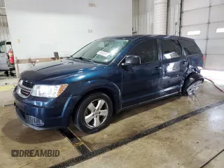 2013 Dodge Journey American Value with VIN 3C4PDCAB4DT581984, listed as a Copart auction lot 59953515 with 166,927 mi miles and Salvage title. Bid and sale history available at DreamBid. Image 1.