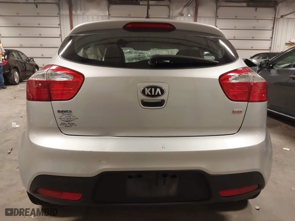 2013 Kia Rio LX with VIN KNADM5A31D6274318, listed as a IAAI auction lot 40986091 with 182,000 mi miles. Bid and sale history available at carsss.com. Image 16.