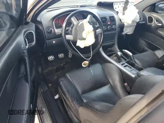 2005 Pontiac GTO with VIN 6G2VX12U75L457697, listed as a Copart auction lot 84683564 with 57,504 mi miles and Salvage Title. Bid and sale history available at carsss.com. Image 8.