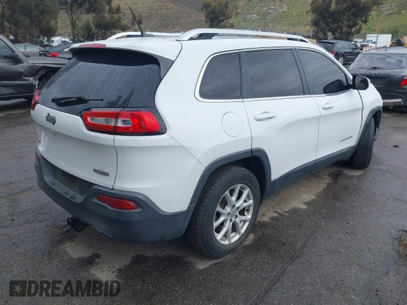 2015 Jeep Cherokee Latitude with VIN 1C4PJMCB1FW751758, listed as a IAAI auction lot 41767154 with 160,349 mi miles. Bid and sale history available at carsss.com. Image 4.