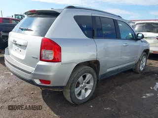 2011 Jeep Compass with VIN 1J4NT1FB4BD252724, listed as a IAAI auction lot 41247389 with 162,028 mi miles. Bid and sale history available at carsss.com. Image 4.