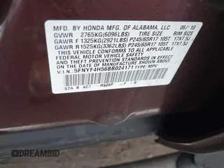 2011 Honda Pilot EX-L with VIN 5FNYF4H56BB024171, listed as a IAAI auction lot 41442621 with 105,104 mi miles. Bid and sale history available at carsss.com. Image 9.