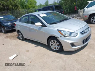 2014 Hyundai Accent GLS z VIN KMHCT4AE1EU637366, wystawiony jako IAAI lot #42455436 z przebiegiem 121 764 mil mil oraz . Historia ofert i sprzedaży dostępna na DreamBid. Obrazek 1.