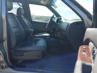 2000 Infiniti QX4 with VIN JNRAR07Y6YW077048, listed as a IAAI auction lot 41947761 with 236,784 mi miles and . Bid and sale history available at DreamBid. Image 5.