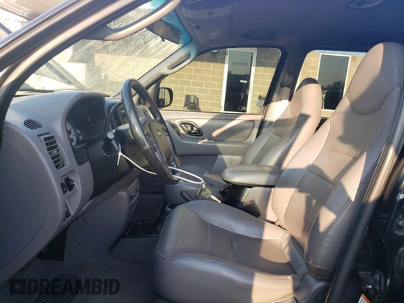 2001 Ford Escape XLT with VIN 1FMCU04141KB40767, listed as a Copart auction lot 71492664 with 118,541 mi miles and Salvage Title. Bid and sale history available at DreamBid. Image 7.