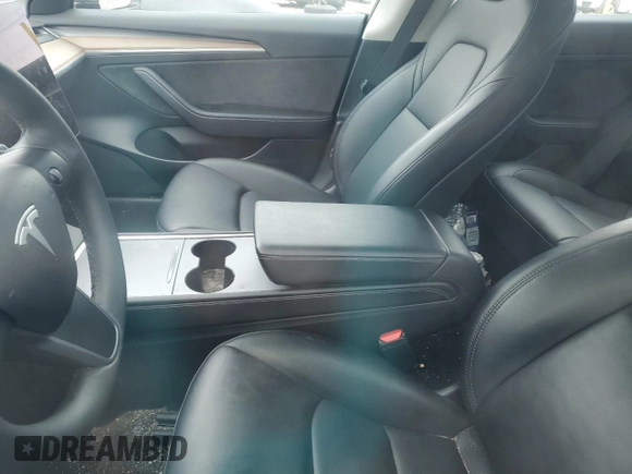 2023 Tesla Model 3 with VIN 5YJ3E1EA7PF599058, listed as a Copart auction lot 57331365 with Not provided miles and Non repairable. Bid and sale history available at DreamBid. Image 7.