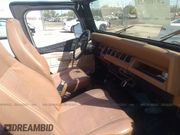1995 Jeep Wrangler S with VIN 1J4FY19P4SP207049, listed as a IAAI auction lot 41315322 with 12,454 mi miles. Bid and sale history available at carsss.com. Image 5.