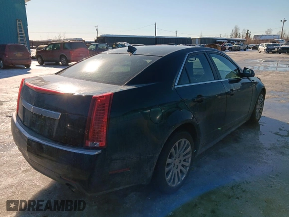 2013 Cadillac CTS Performance with VIN 1G6DK5E33D0111422, listed as a Copart auction lot 50121745 with 129,335 mi miles and Salvage Title. Bid and sale history available at DreamBid. Image 3.