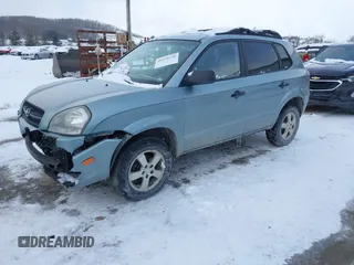 2006 Hyundai Tucson GL with VIN KM8JM72B06U298904, listed as a IAAI auction lot 41370728 with 209,284 mi miles. Bid and sale history available at carsss.com. Image 2.