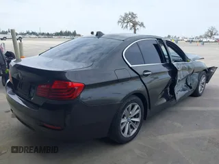 2014 BMW 5 Series 528i with VIN WBA5A5C52ED503033, listed as a IAAI auction lot 41562997 with 127,564 mi miles. Bid and sale history available at carsss.com. Image 4.