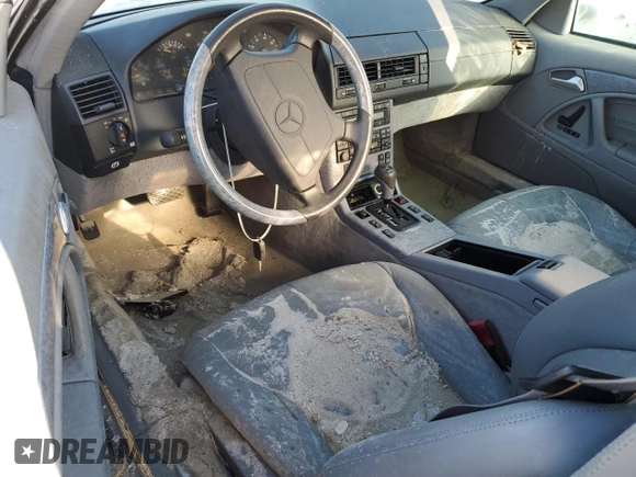1997 Mercedes-Benz SL 500 z VIN WDBFA63F1VF152883, wystawiony jako Copart lot #77570524 z przebiegiem Nie podano mil oraz Szkoda całkowita • Salvage title. Historia ofert i sprzedaży dostępna na DreamBid. Obrazek 8.