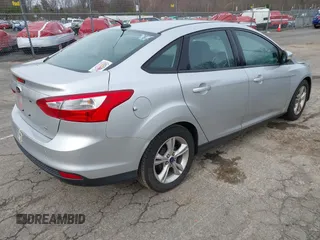 2014 Ford Focus SE with VIN 1FADP3F24EL285126, listed as a IAAI auction lot 41956143 with 113,415 mi miles. Bid and sale history available at carsss.com. Image 4.