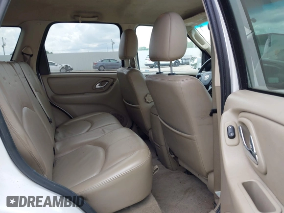 2006 Mazda Tribute i with VIN 4F2YZ02Z56KM31953, listed as a IAAI auction lot 42167223 with 185,169 mi miles and . Bid and sale history available at carsss.com. Image 8.
