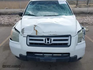 2006 Honda Pilot EX-L with VIN 2HKYF18576H517590, listed as a IAAI auction lot 41802601 with 233,833 mi miles. Bid and sale history available at carsss.com. Image 12.
