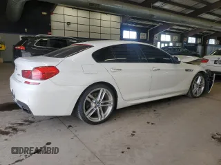 2015 BMW 6 Series 650i xDrive with VIN WBA6B4C54FD761440, listed as a Copart auction lot 45851515 with 64,060 mi miles and Salvage Title. Bid and sale history available at DreamBid. Image 3.