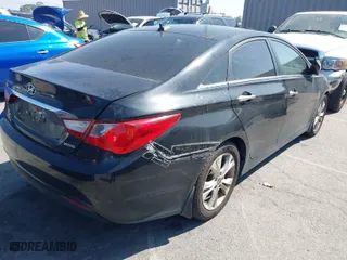 2012 Hyundai Sonata 2.4L Limited PZEV with VIN 5NPEC4AC4CH456183, listed as a IAAI auction lot 42014706 with 128,484 mi miles. Bid and sale history available at carsss.com. Image 4.