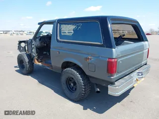 1988 Ford Bronco XL with VIN 1FMEU15N3JLA69197, listed as a IAAI auction lot 42082657 with 287,213 mi miles. Bid and sale history available at carsss.com. Image 3.
