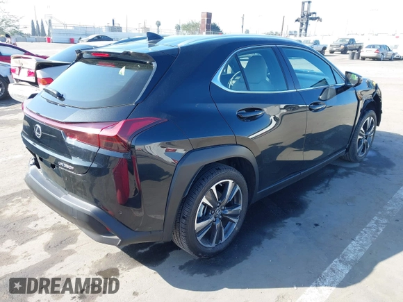 2024 Lexus UX with VIN JTHX6JBH7R2162231, listed as a IAAI auction lot 41665179 with 21,913 mi miles. Bid and sale history available at carsss.com. Image 4.