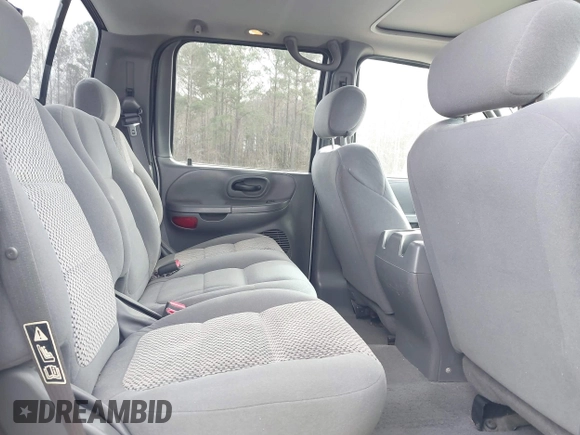2003 Ford F-150 XLT with VIN 1FTRW08L73KA73945, listed as a IAAI auction lot 41474904 with 122,080 mi miles. Bid and sale history available at carsss.com. Image 8.