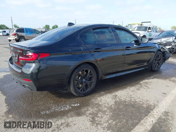 2023 BMW 5 Series 530e with VIN WBA13AG09PCL56556, listed as a IAAI auction lot 42098427 with Not provided miles and . Bid and sale history available at DreamBid. Image 4.