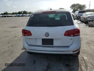 2017 Volkswagen Touareg Sport with VIN WVGEF7BP0HD006792, listed as a Copart auction lot 47895813 with 52,432 mi miles and . Bid and sale history available at DreamBid. Image 6.