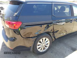 2016 Kia Sedona SX with VIN KNDMC5C15G6143818, listed as a IAAI auction lot 42051284 with 97,666 mi miles and . Bid and sale history available at carsss.com. Image 6.