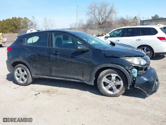 2018 Honda HR-V LX with VIN 3CZRU6H31JM731249, listed as a IAAI auction lot 41801350 with 63,868 mi miles. Bid and sale history available at carsss.com. Image 14.
