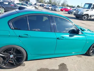 2014 BMW 3 Series 335i with VIN WBA3A9C52EF686470, listed as a IAAI auction lot 41411723 with 89,816 mi miles. Bid and sale history available at carsss.com. Image 13.