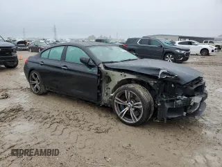 2015 BMW M6 z VIN WBS6C9C50FD467894, wystawiony jako Copart lot #70394234 z przebiegiem 72 625 mil mil oraz Szkoda całkowita • Salvage title. Historia ofert i sprzedaży dostępna na DreamBid. Obrazek 4.
