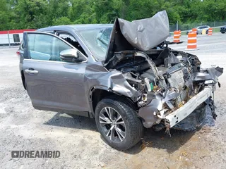 2019 Toyota Highlander LE with VIN 5TDBZRFH5KS722354, listed as a IAAI auction lot 42252775 with 97,141 mi miles and . Bid and sale history available at DreamBid. Image 1.
