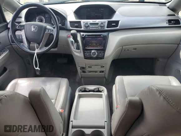 2014 Honda Odyssey EX-L with VIN 5FNRL5H61EB114764, listed as a Copart auction lot 61189305 with 167,185 mi miles and Clean title. Bid and sale history available at DreamBid. Image 8.